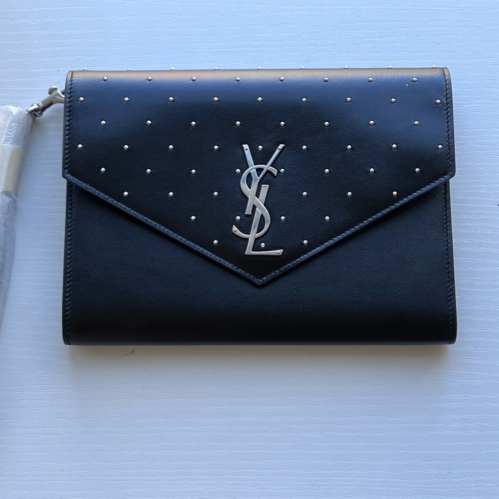 Yves Saint Laurent
Cassandre Studded Flap Clutch
Color: Nero